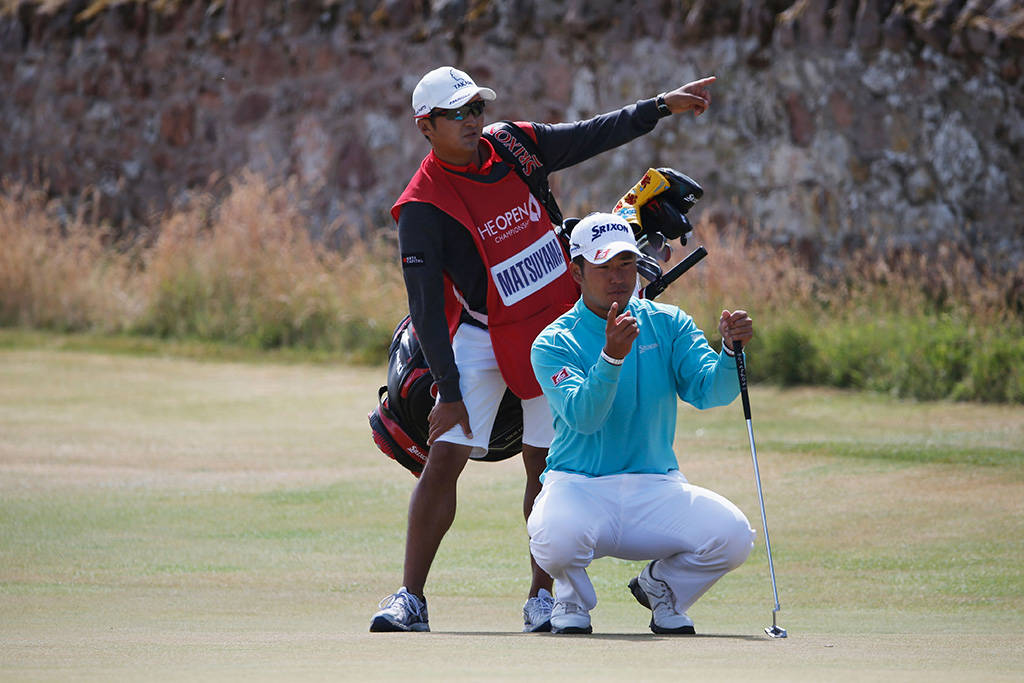 Hideki Matsuyama lines up a putt at Muirfield in 2013